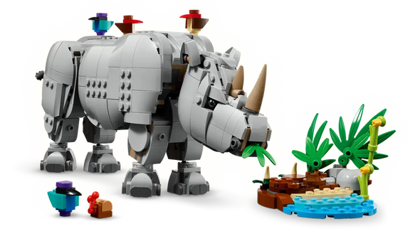 Wild Animals: Majestic Rhino with Birds